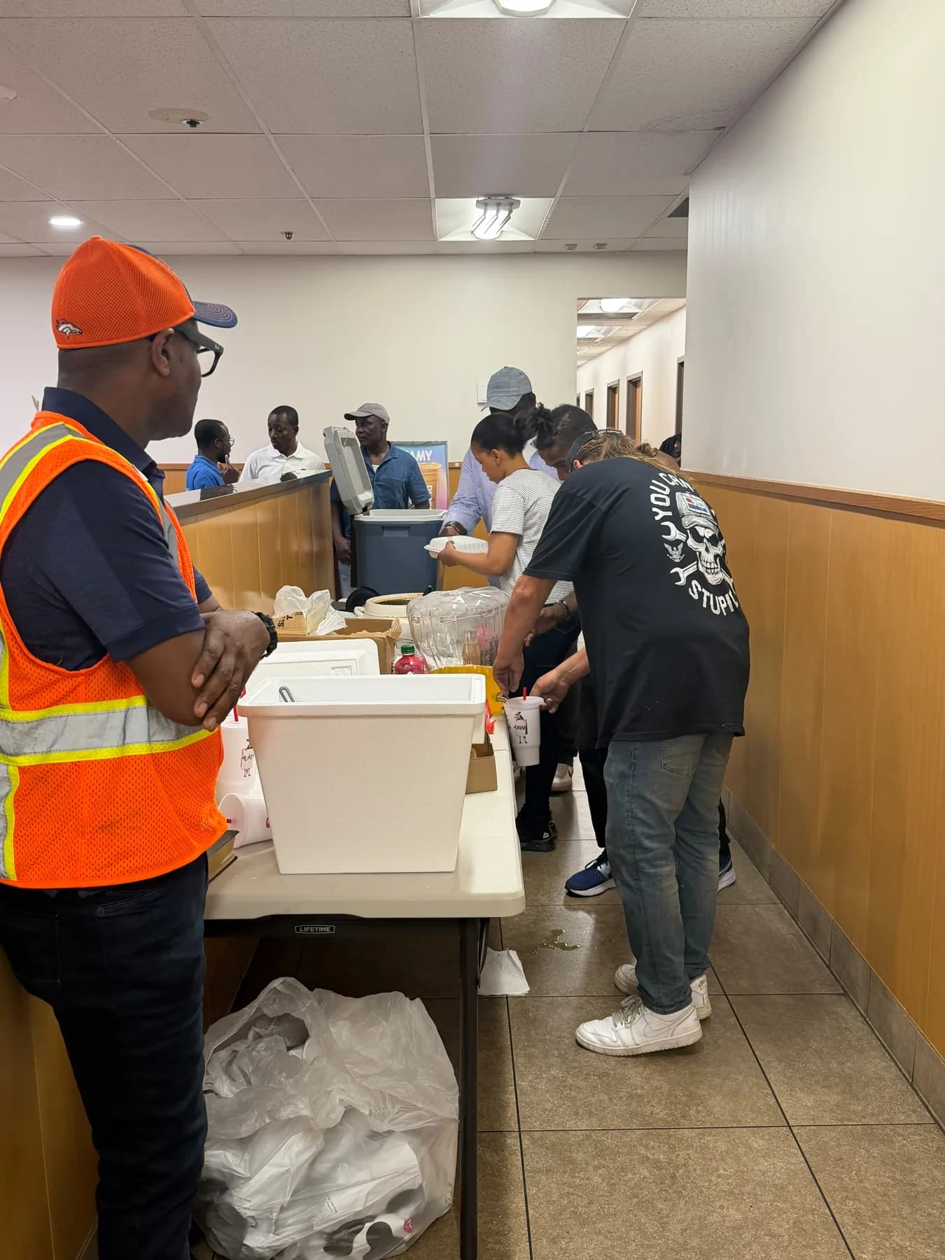 MHC volunteers preparing food and refreshments for community outreach