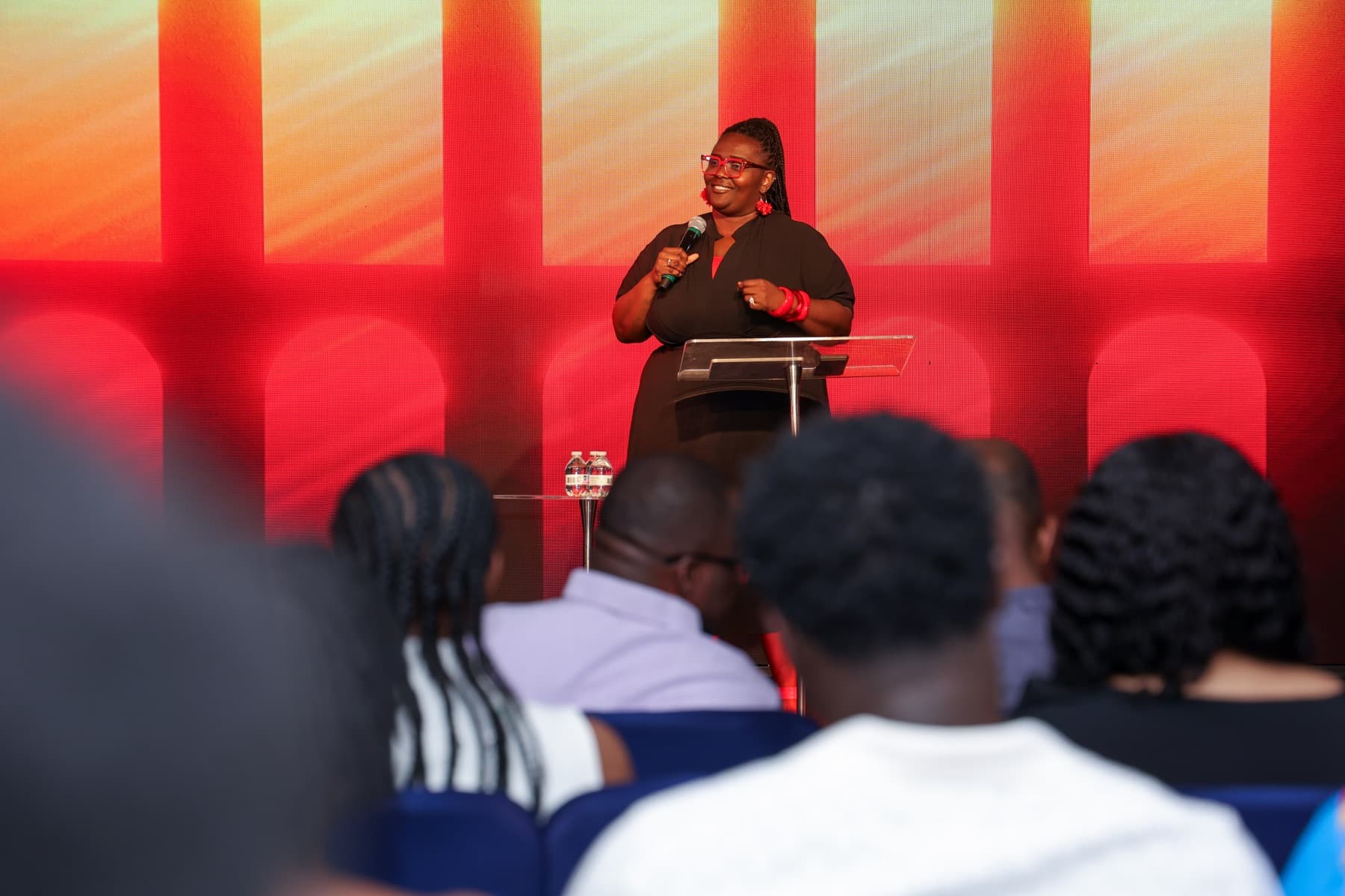 Mrs. Barbara Gomez ministering on stage at MHC